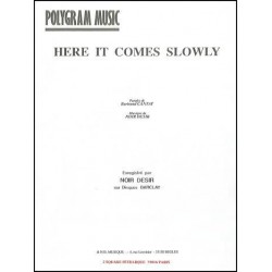 HERE IT COMES SLOWLY