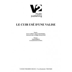 LE CUIR USÉ D'UNE VALISE